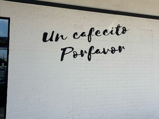 O-Ton: <i>Habe gerade in einem argentinischen Café einen Café con Leche getrunken</i>